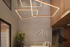 Hall de entrada com logo em tijolinho branco e luminária geométrica de LED — A1 Elementos da Terra em Coqueiros, Florianópolis