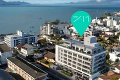 Vista aérea do empreendimento no bairro Coqueiros com o mar da Baía Norte ao fundo — A1 Elementos da Terra em Coqueiros, Florianópolis