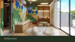 Espaço kids com painel mural colorido, poltronas brancas e mesas infantis — Adore Cacupé em Cacupé, Florianópolis
