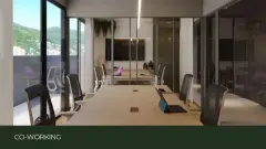 Espaço coworking com mesa de conferência, cadeiras e sala de reunião com parede de vidro — Adore Cacupé em Cacupé, Florianópolis