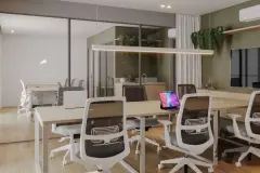 Espaço coworking com bancadas abertas, sala de reunião com vidro e TV — Adore Canasvieiras em Canasvieiras, Florianópolis