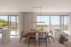 Sala de jantar com mesa ovalada e janelas panorâmicas com vista para montanhas e mar — Adore Level Up em Cachoeira do Bom Jesus, Florianópolis