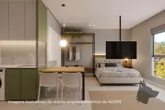 Studio com cozinha verde, mesa de jantar, closet aberto e cama de casal com TV — Adore Smart Nova Cachoeira em Cachoeira do Bom Jesus, Florianópolis