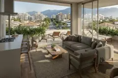 Perspectiva ilustrativa da fachada à noite com jardim vertical iluminado, logo Almare Jurerê e casal na calçada — Almare Jurerê em Jurerê, Florianópolis