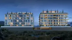 Perspectiva ilustrativa noturna dos dois edifícios do Areias do Leste com janelas iluminadas, varandas e morros ao fundo — Areias do Leste em Barra da Lagoa, Florianópolis