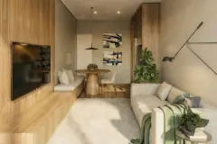 Perspectiva da sala de estar integrada com sofá, TV em painel de madeira, mesa de jantar redonda e bancada com planta ornamental — Art Blue View em Jurerê, Florianópolis