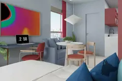 Perspectiva do studio com sala integrada, sofá azul, mesa redonda, home office com laptop e obra de arte colorida na parede, janela com vista para o Centro — Art Places em Centro, Florianópolis