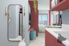 Perspectiva do studio com hall de entrada, espelho de corpo inteiro, bancada de cozinha vermelha e sala integrada ao fundo — Art Places em Centro, Florianópolis