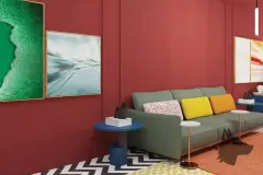 Perspectiva do lobby com sofá verde, almofadas coloridas, mesas de apoio azuis e obras de arte nas paredes vermelhas — Art Places em Centro, Florianópolis