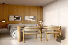 Perspectiva do studio com cama de casal, mesa de jantar de madeira, painel de madeira e janela com cortina — At One Jurerê Studios em Jurerê, Florianópolis