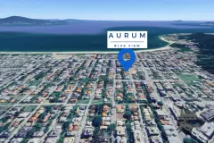 Infográfico aéreo de localização do Aurum Blue View com pino marcador, praia de Jurerê e lagoa ao fundo — Aurum Blue View em Jurerê, Florianópolis