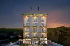 Perspectiva da fachada do B7 Essence Brava ao entardecer com 5 andares, varandas com vegetação e térreo comercial iluminado — B7 Essence Brava em Praia Brava, Florianópolis