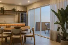 Perspectiva da sala de jantar do apartamento do B7 Essence Brava com mesa redonda de madeira, cadeiras e porta de vidro para a varanda — B7 Essence Brava em Praia Brava, Florianópolis