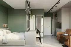 Perspectiva do studio do B7 Park Marina em tons de verde com cama de casal, mesa de jantar e cozinha integrada — B7 Park Marina em Agronômica, Florianópolis
