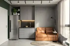 Foto da sala integrada com kitchenette em cinza, sofá de couro caramelo e janela com luz natural — B7 Park Marina em Agronômica, Florianópolis