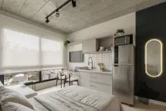 Foto do studio do B7 Park Marina com cozinha americana, cama, mesa de trabalho e espelho oval iluminado — B7 Park Marina em Agronômica, Florianópolis
