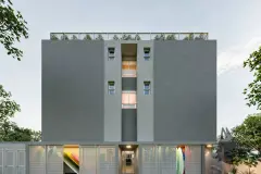 Perspectiva da fachada traseira do Barra 4 Club Residence com acabamento cinza e iluminação ao entardecer — Barra 4 Club Residence em Barra da Lagoa, Florianópolis