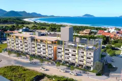 Vista aérea do Barra 4 Club Residence com a Praia da Barra da Lagoa e o oceano ao fundo — Barra 4 Club Residence em Barra da Lagoa, Florianópolis