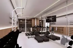 Academia equipada com esteiras, aparelhos de musculação, halteres e parede espelhada — Bella Sintra Residence em Estreito, Florianópolis