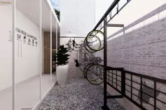 Bicicletário coberto com suportes verticais para bicicletas ao lado da lavanderia coletiva — Bella Sintra Residence em Estreito, Florianópolis