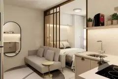 Studio compacto com sofá, cama com divisória em rattan, cozinha americana e espelho oval — Bella Sintra Residence em Estreito, Florianópolis