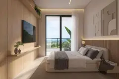 Dormitório com cama de casal, painel em madeira ripada, TV embutida e janela com vista para o mar — Bellomonte Residence em Ingleses, Florianópolis