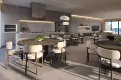 Espaço gourmet com churrasqueira, ilha central, mesas de jantar e sofá com TV ao fundo — Bellomonte Residence em Ingleses, Florianópolis
