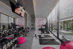 Academia com parede de tijolos, halteres, kettlebells, esteiras e letreiro neon Go Hard or Go Home — BG Connect Trindade 2 em Trindade, Florianópolis