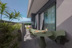 Varanda com mesa verde orgânica, cadeiras, prancha de surf e vista para as montanhas da Trindade — BG Connect Trindade 2 em Trindade, Florianópolis