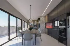 Sala de jantar e cozinha integrada com mesa longa, cadeiras cinza, armários pretos, pendente de esferas e janela — Bohn Residence em Ingleses, Florianópolis