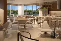 Salão de festas amplo com mesas redondas, cadeiras, bancada gourmet e janelões com vista para o jardim — Brio 778 em Estreito, Florianópolis
