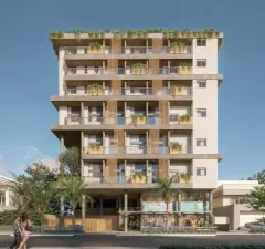 Perspectiva frontal da fachada do Brizz Smart Stay, edifício de 9 andares com sacadas e frisos em madeira — Brizz Smart Stay em Cachoeira do Bom Jesus, Florianópolis