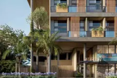 Perspectiva frontal alternativa do Brizz Smart Stay com palmeiras, jardim e lobby em vidro — Brizz Smart Stay em Cachoeira do Bom Jesus, Florianópolis