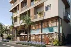Gourmet do Brizz Smart Stay com ilha curvilínea, forno embutido, bancada em aço e mesas ao fundo — Brizz Smart Stay em Cachoeira do Bom Jesus, Florianópolis