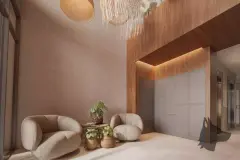 Varanda ao entardecer com sofá, fire pit de pedra, poltrona e balcão bar com prateleiras de vinho — Brizz Smart Stay em Cachoeira do Bom Jesus, Florianópolis