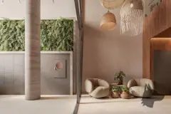 Sala com sofá listrado azul e branco, roda de leme decorativa, mesa redonda e cozinha integrada — Brizz Smart Stay em Cachoeira do Bom Jesus, Florianópolis