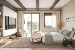 Suíte com cama de casal, cabeceira acolchoada, puf branco, TV e sacada com vista para as montanhas — Brizz Smart Stay em Cachoeira do Bom Jesus, Florianópolis