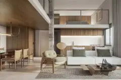Duplex com sala de estar, cozinha, mezanino com cama, sofá branco e poltrona verde — Brizz Smart Stay em Cachoeira do Bom Jesus, Florianópolis