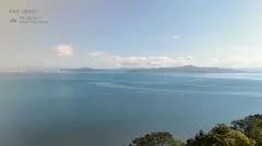 Vista aérea face oeste do Cacupé Náutico Residence com Baía Norte, ilhas e cidade de Florianópolis ao fundo — Cacupé 4 Náutico Residence em Cacupé, Florianópolis
