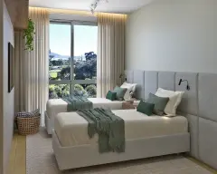 Dormitório com cama de casal, home office integrado com bancada e estante, iluminação indireta e plantas — Cacupé 4 Náutico Residence em Cacupé, Florianópolis