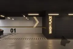 Garagem do Cais by Nova com sinalização de saída neon, vaga numerada e porta Wash Place iluminada — Cais by Nova em Centro, Florianópolis