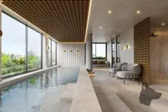 Piscina coberta do Cais by Nova com teto em treliça dourada, poltronas, sofá e janelão com jardim externo — Cais by Nova em Centro, Florianópolis