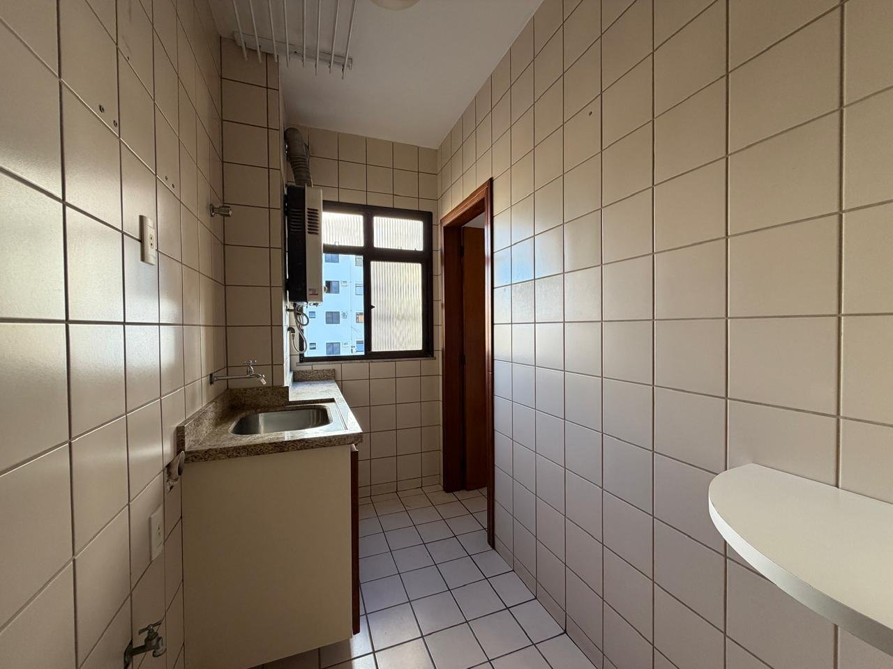 Apartamento com 2 quartos, sacada e 1 vaga de garagem, Centro