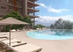 Perspectiva ilustrativa da piscina infinity externa com espreguiçadeiras e guarda-sol ao pé do edifício — D/Season Residence Club em João Paulo, Florianópolis