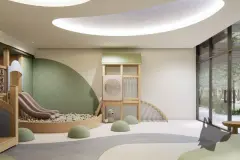Perspectiva ilustrativa da brinquedoteca com escorregador, piscina de bolinhas, módulo de escalada e parede verde — D/Season Residence Club em João Paulo, Florianópolis