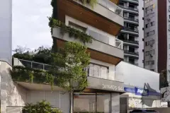 Perspectiva da entrada e fachada do Domus 544 com nome do edifício e área ajardinada — Domus 544 em Agronômica, Florianópolis