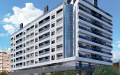 Perspectiva da fachada do Essência Carlessi no Córrego Grande com revestimento branco e varandas azuis, ângulo alternativo — Essência Carlessi em Córrego Grande, Florianópolis
