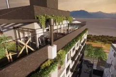 Vista aérea do rooftop com academia, piscina e jardins suspensos com vista panorâmica para o mar e montanhas — HUB Beira Mar em Saco dos Limões, Florianópolis