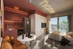 Studio com cozinha integrada em vinho, sala de estar, cama de casal e varanda iluminada por luz natural — Imob Trindade On em Trindade, Florianópolis