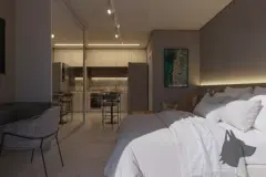 Dormitório com cama de casal, cabeceira em madeira com iluminação embutida e cozinha integrada ao fundo em tons escuros — Imperial Residence em Campeche, Florianópolis